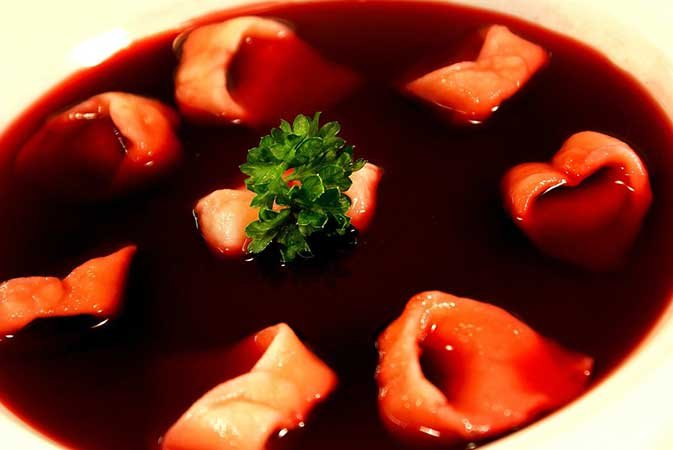 Polish Barszcz (clear beetroot soup usually served with small dumplings - uszka)